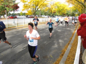 There's Candace in the blue/green shirt (this was at Mile 12.7-ish, where my dad was)
