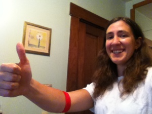 Still grinning (with my post-donation bandaged arm and a thumbs-up)